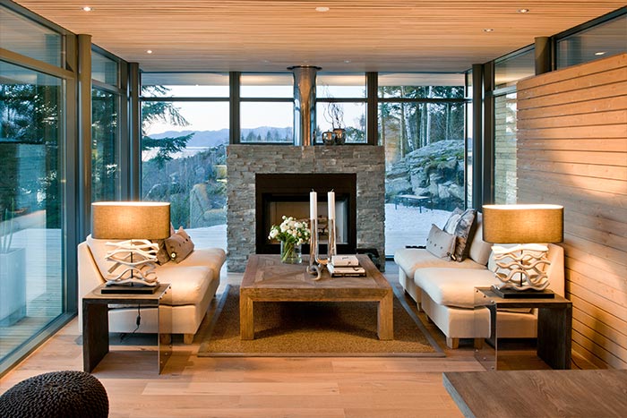 Beautiful Living Room With Modern White Sofas, Fireplace And Spectacular View