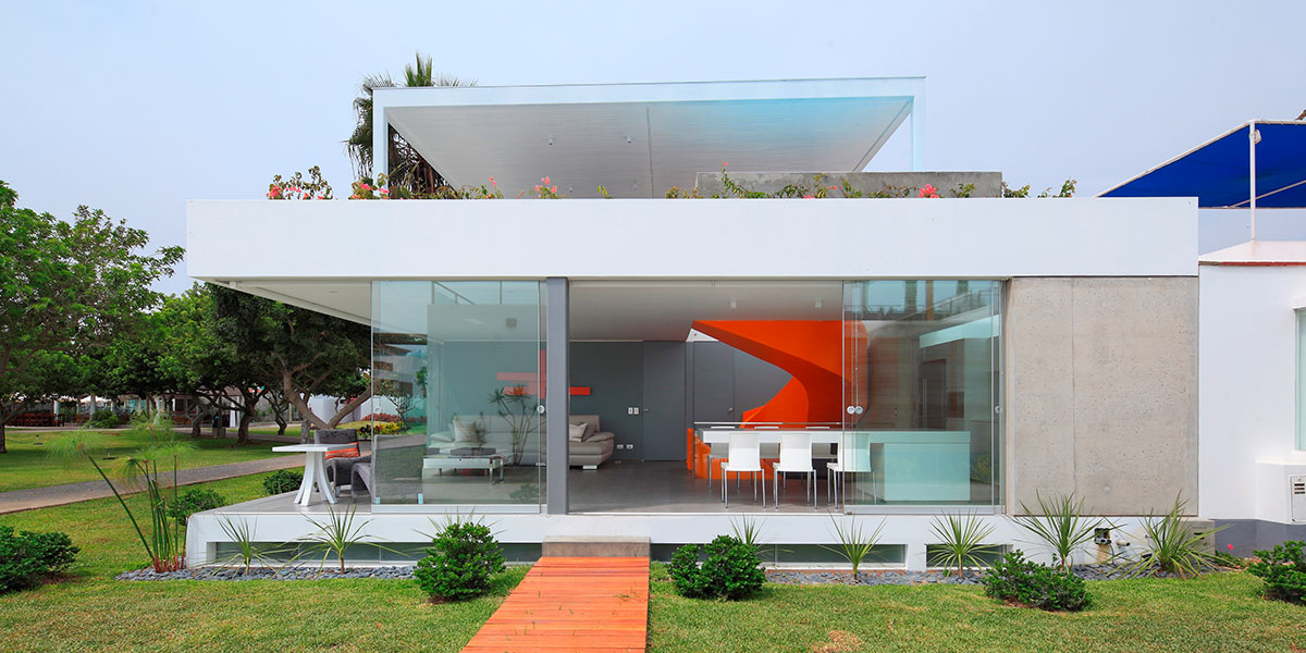 Stunning House In Peru With Orange Spiral Staircase