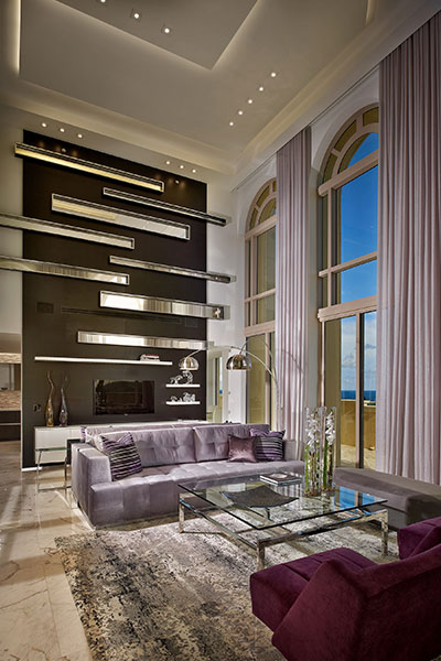 Contemporary Living Room With Large Mirrors On A Wall And Spectacular Ocean View