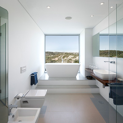 Contemporary white bathroom with stunning view