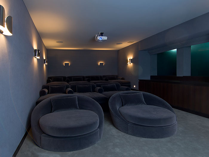 Hopen Place-Home theater by Whipple Russell Architects