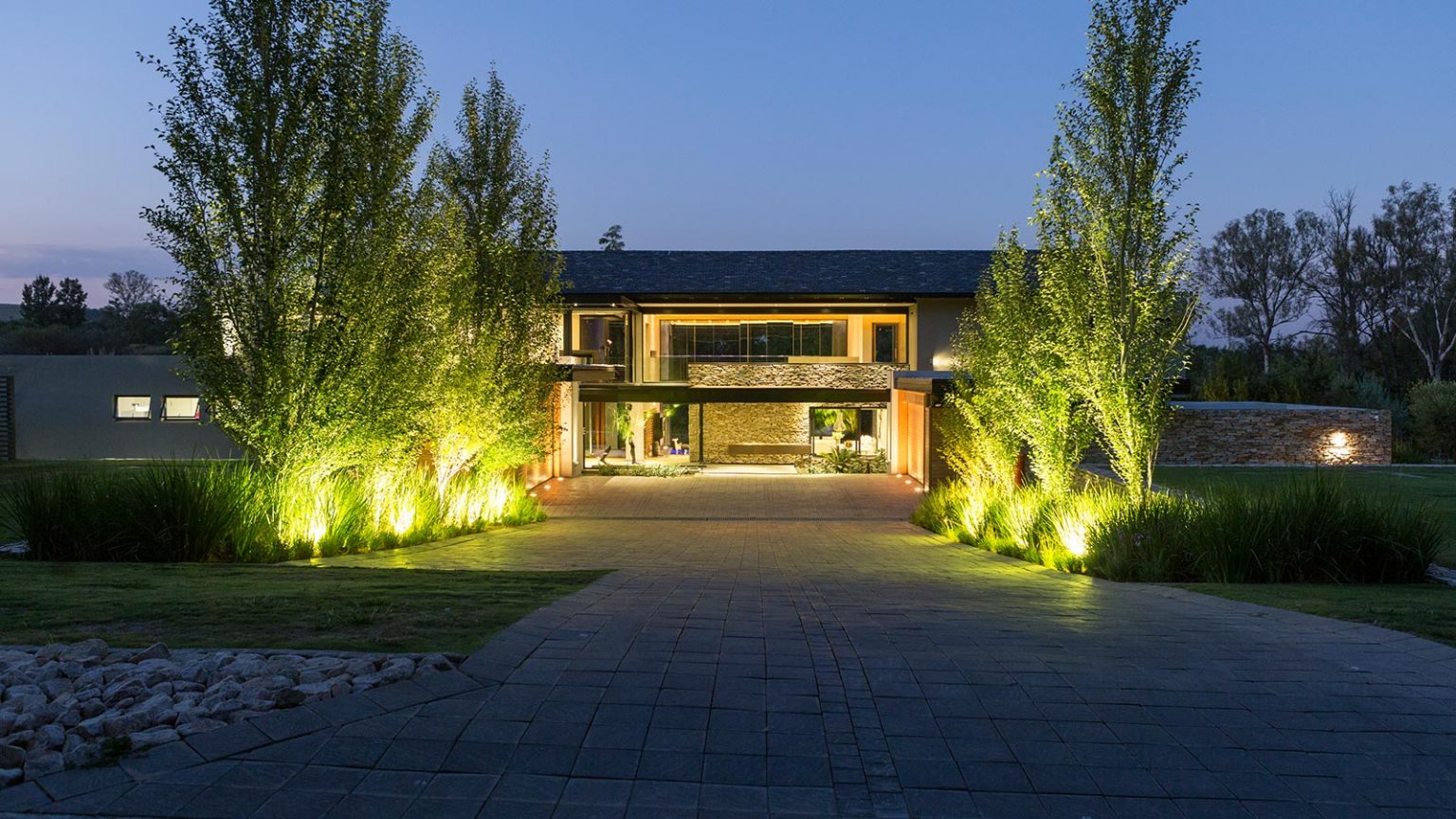 Contemporary farmhouse in South Africa takes outdoor entertainment to