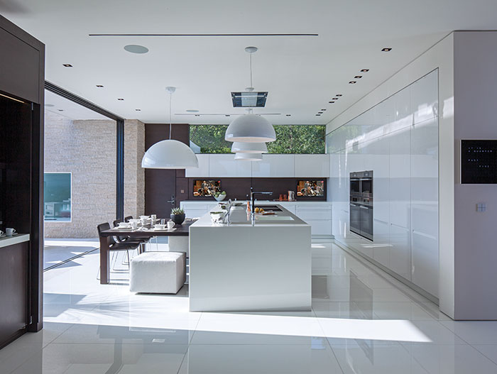 Laurel Way Residence: Luxurious white kitchen by Whipple Russell Architects