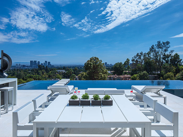 Laurel Way Residence: Outdoor entertainment area with zero edge infinity pool and impressive views