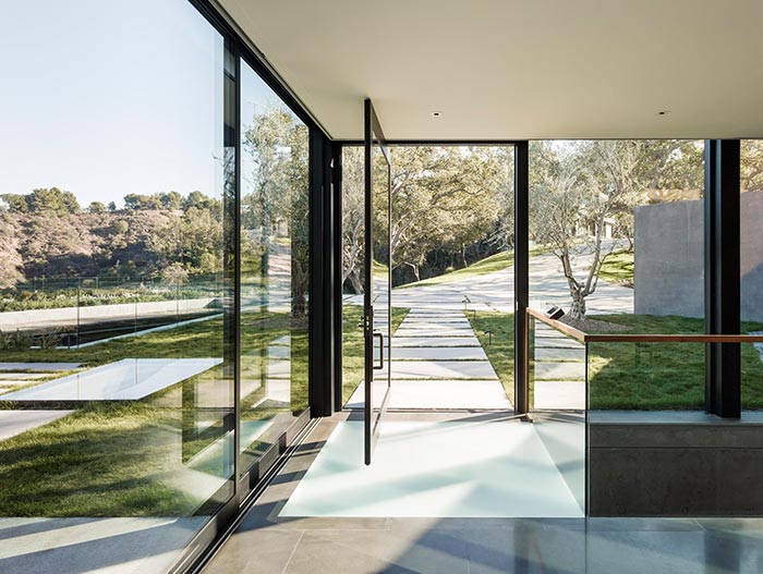 Modern House With Large Windows And Glass Door