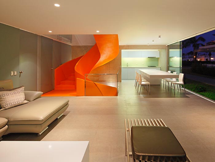 Modern Sofa And Orange Spiral Staircase