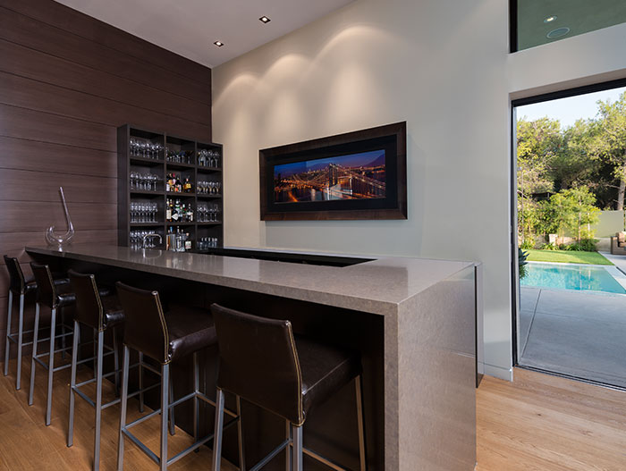 Stylish kitchen open to the living room and outdoor area