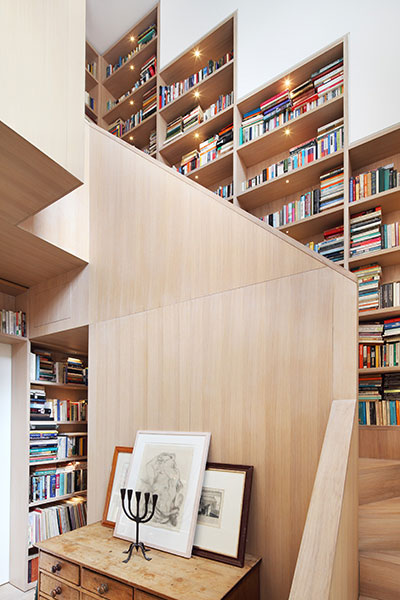 Walls Of Books Around Wooden Staircase