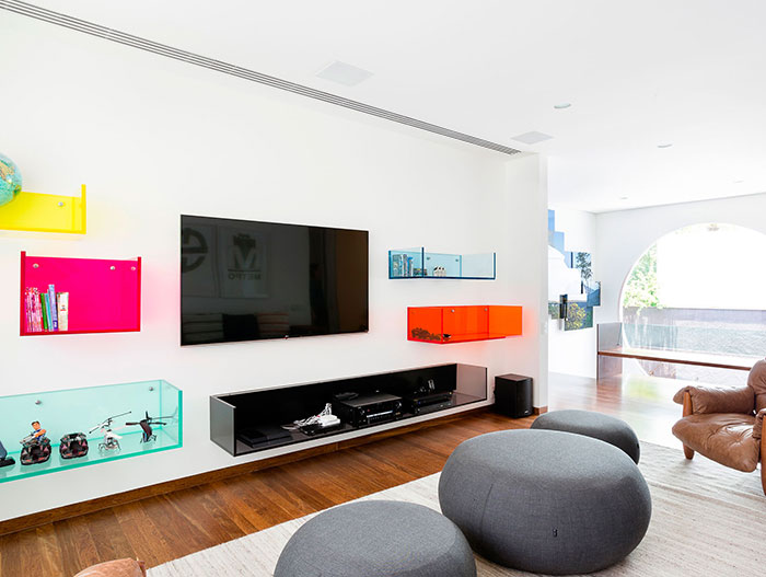 Colorful lounge area inside modern AA House by Pascali Semerdjian Architects