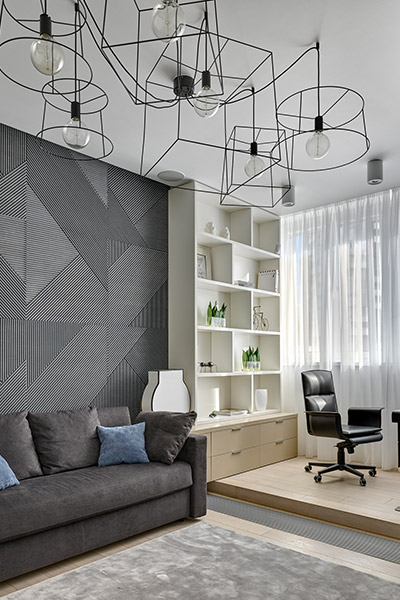 Amazing home office design including contemporary lighting fixture, modern furniture, playful textures used on the walls makes this space exude an air of sophistication - interior design by Alexandra Fedorova