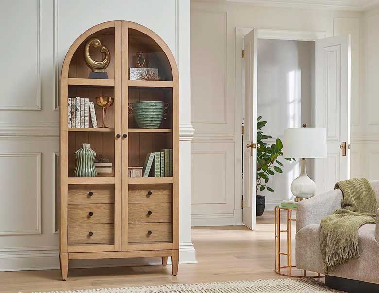 Arched cabinet with glass doors, three adjustable shelves and three drawers