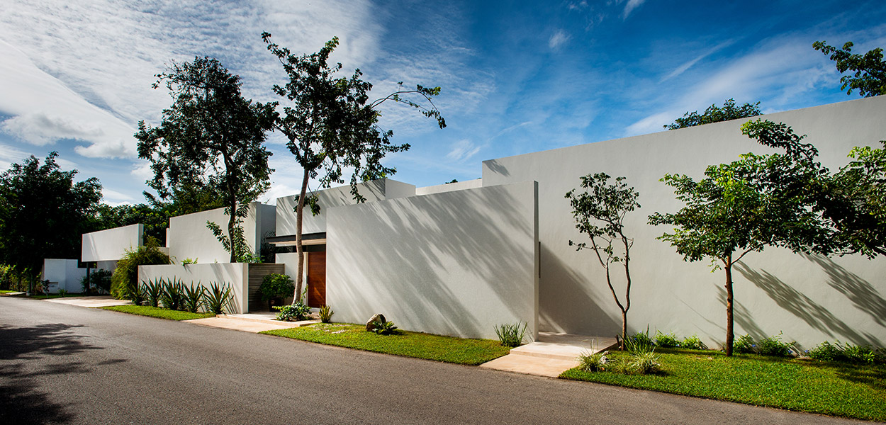 Spectacular architecture in award-winning house in Yucatan, Mexico with lush garden and swing chair - designed by Seijo Peón Arquitectos