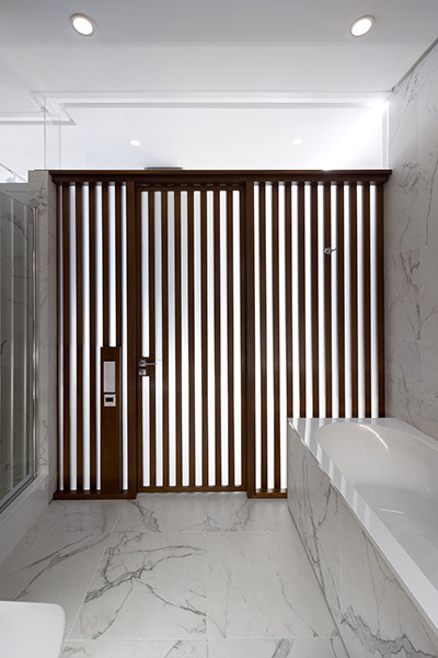 Stunning bathroom entrance in elegant Ukrainian apartment by NOTT Design