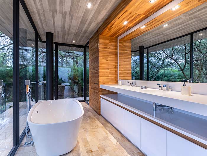 Bathroom design idea in a spectacular single-family home in perfect balance with the surrounding environment - Tacuri House by Gabriel Rivera Arquitectos