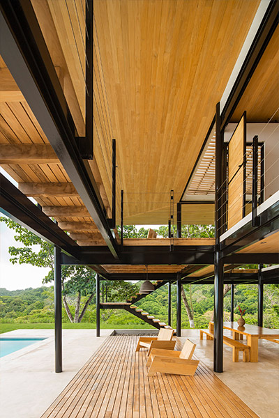 Stunning outdoor area of a beautiful eco-friendly house with movable wooden walls in Costa Rica