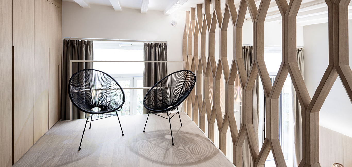 Stylish furnishings were chosen for this three-level Italian apartment - interior design by Archiplan Studio