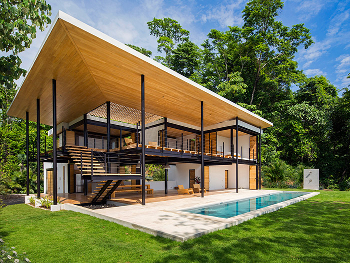 Beautiful exterior of an eco-friendly house with stunning pool and breathtaking views in Costa Rica