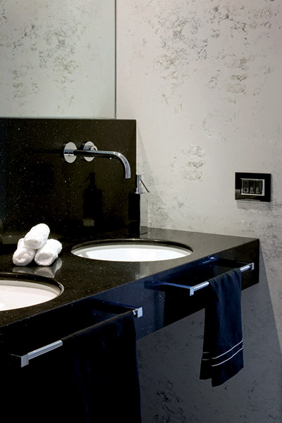 Black bathroom design in remodeled duplex apartment in Benevento, Italy by Ernesto Fusco