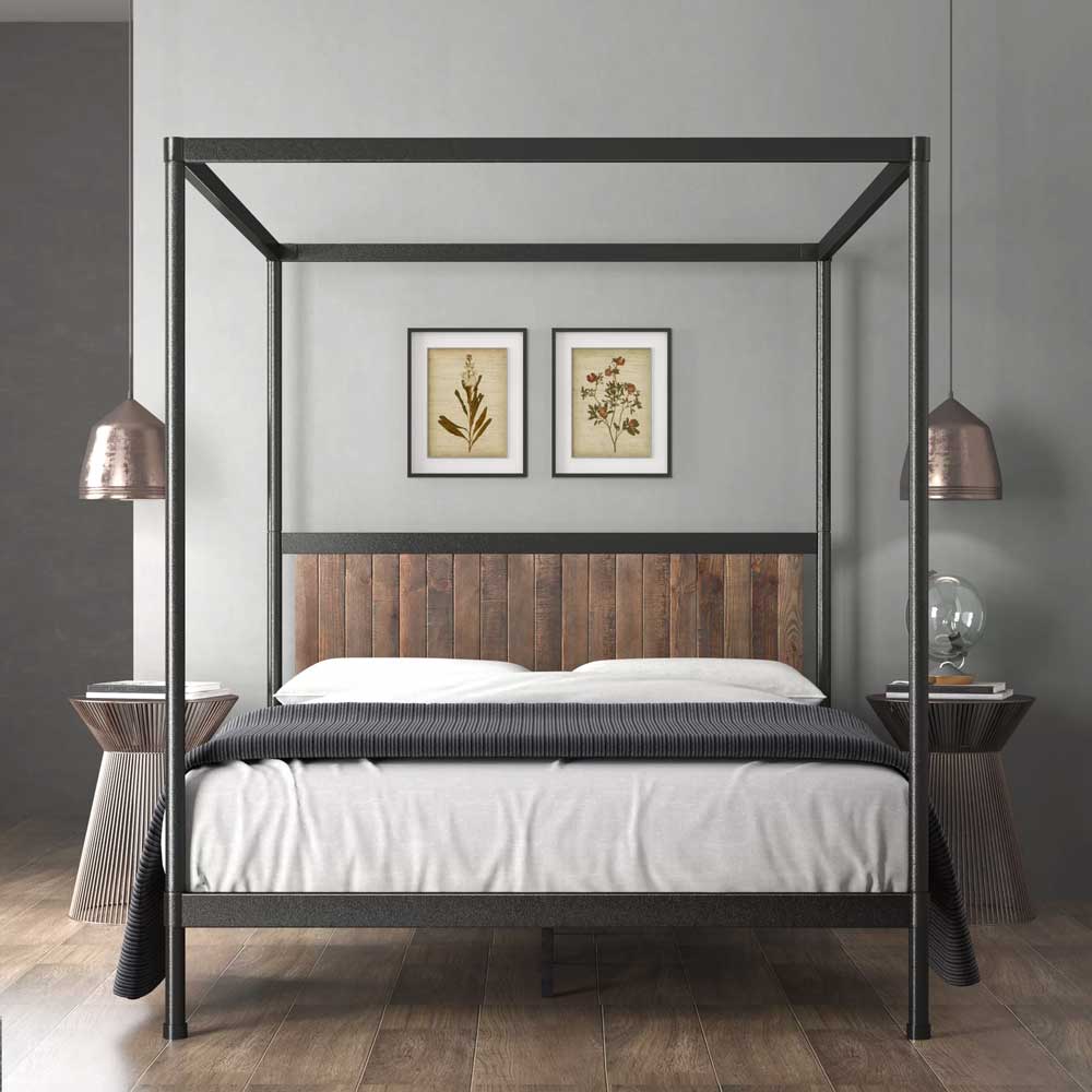 Black canopy bed with wooden headboard