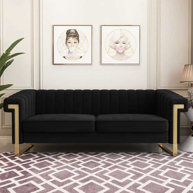 Black Chesterfield sofa with stainless steel legs