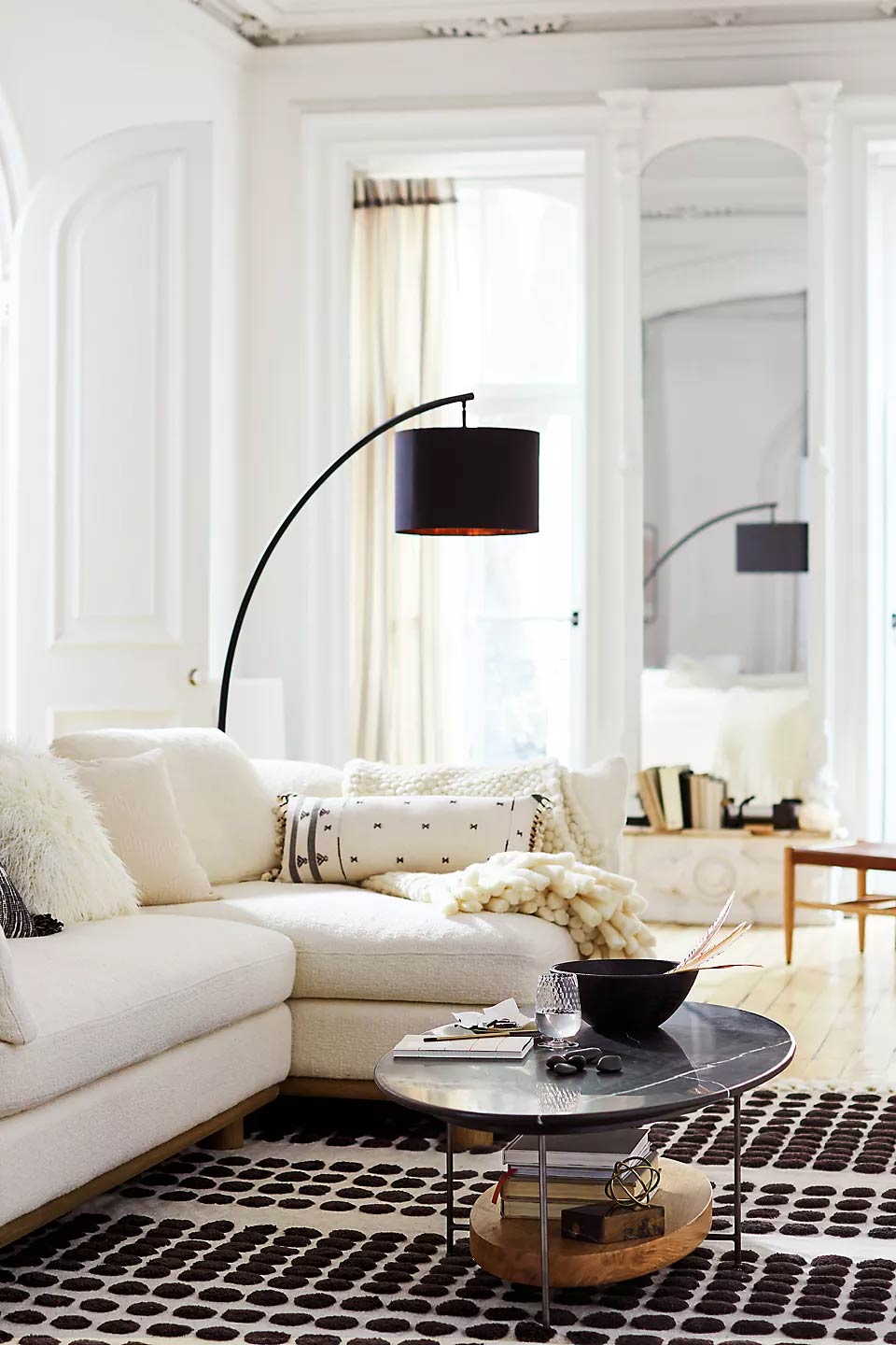 Black marble modern coffee table with reclaimed oak wood shelf and thin cast iron legs