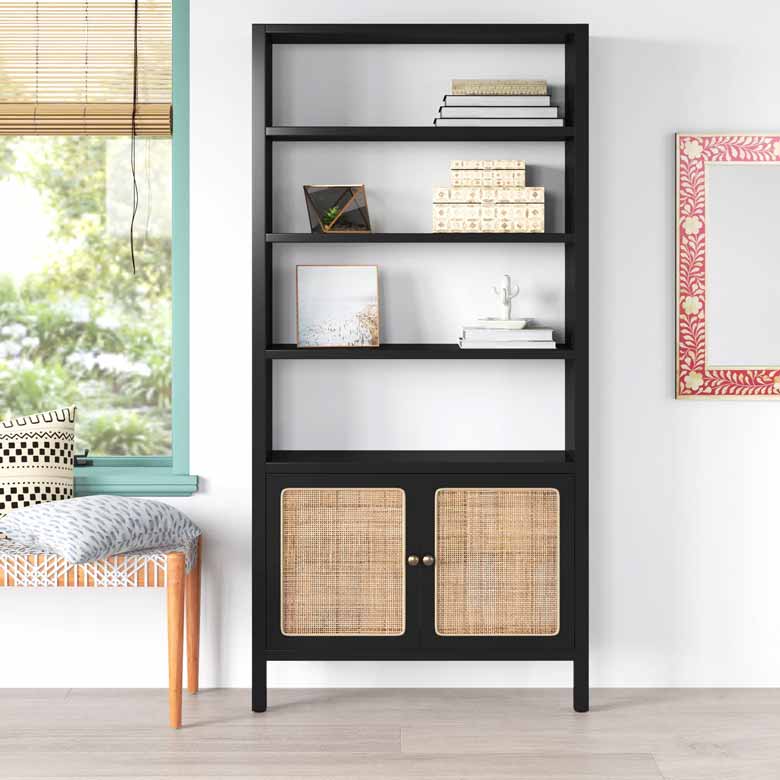 Black rattan bookcase with four open shelves