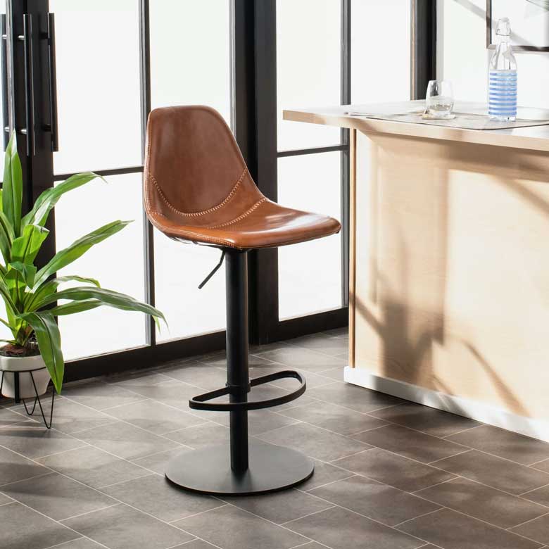 Brown leather swivel bar stool with adjustable height for sale