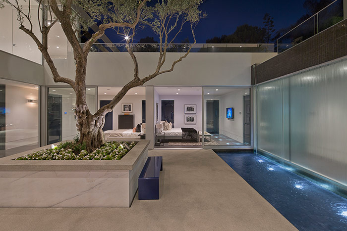 Carla Ridge residence: Beverly Hills mega mansion with gorgeous interior courtyard centered around old olive tree