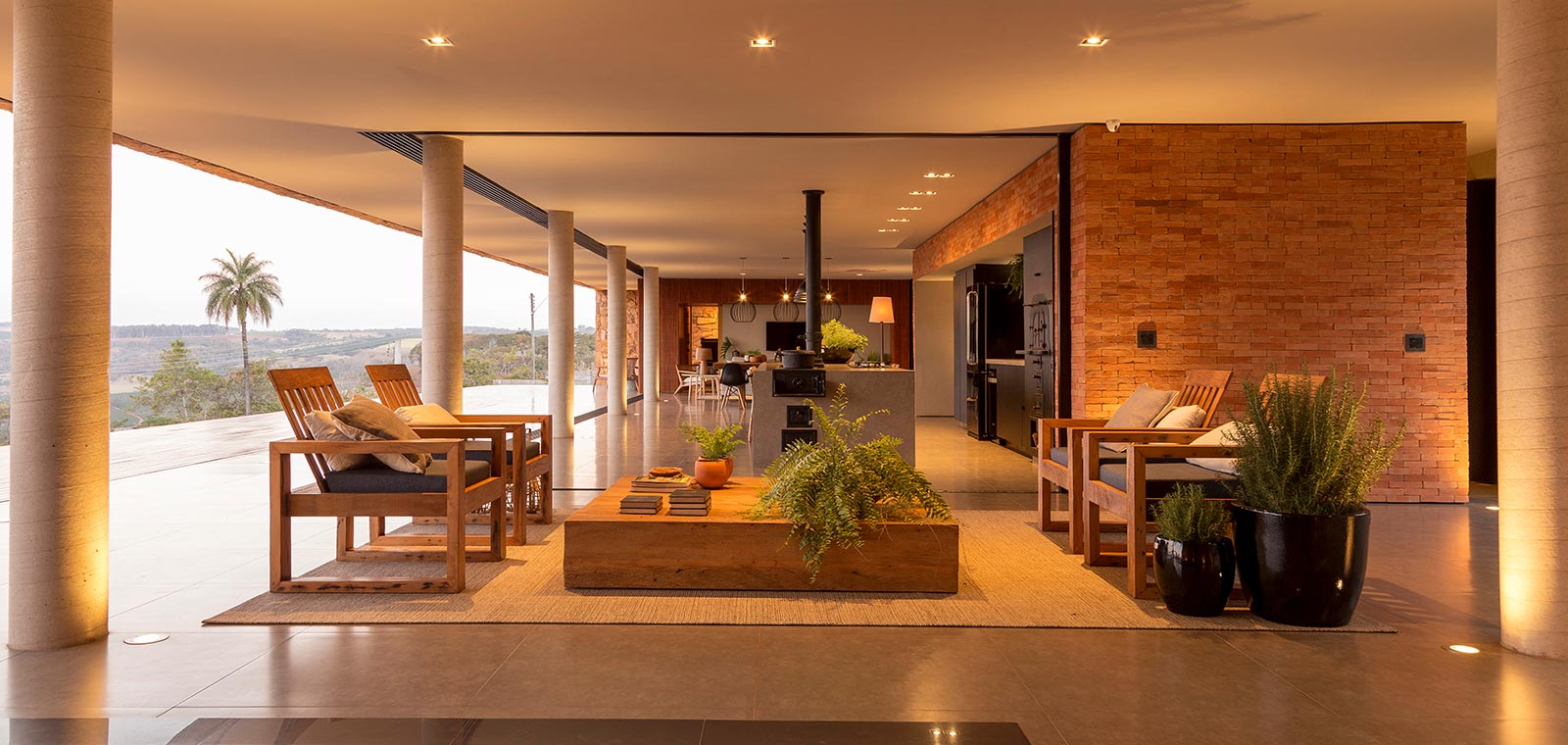 Casa Das Pedras by mf+arquitetos located in Brazil - open-plan living and kitchen area