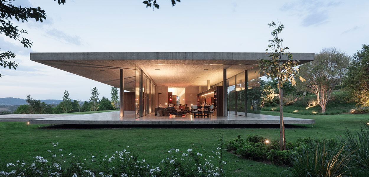 Casa Redux - a minimalist Brazilian house by Studio MK 27 that appears to float above the ground