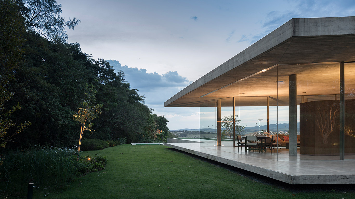 Casa Redux by Studio MK 27: Minimalist Brazilian house that appears to float above the ground