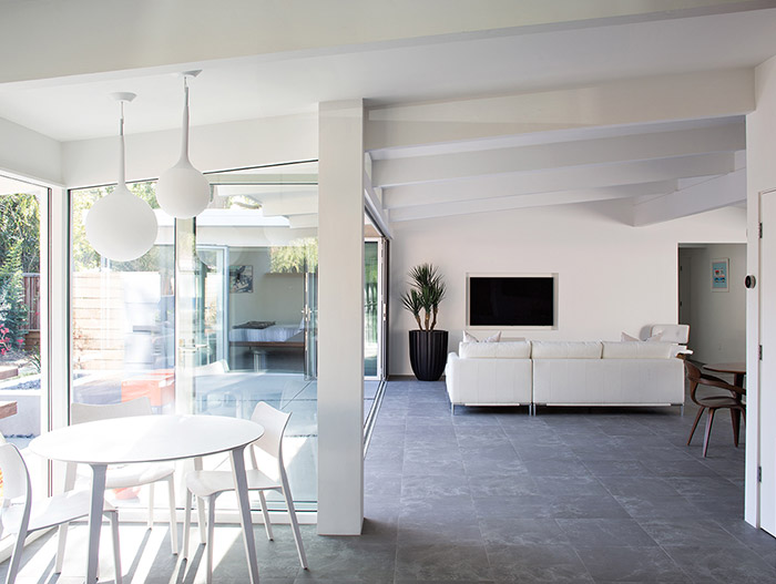 Modern white interior in a renovated Silicon Valley house by Klopf Architecture