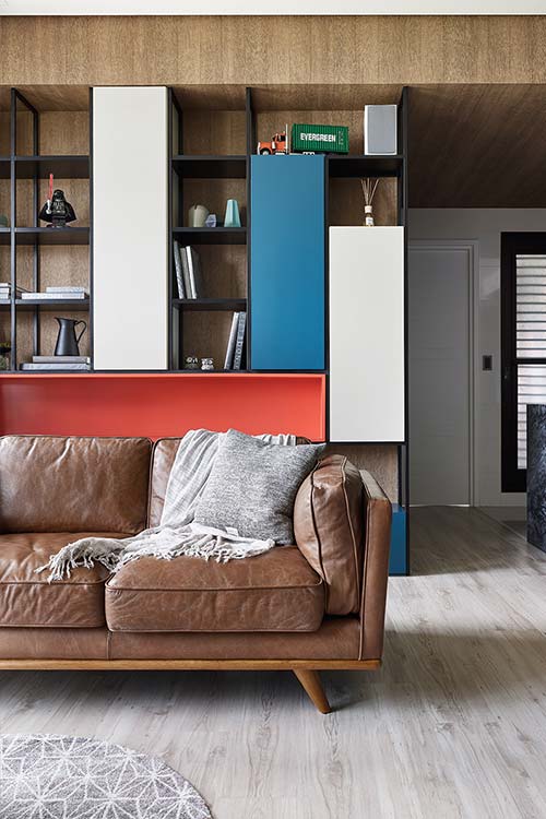 Colorful furniture makes this small living area feel modern