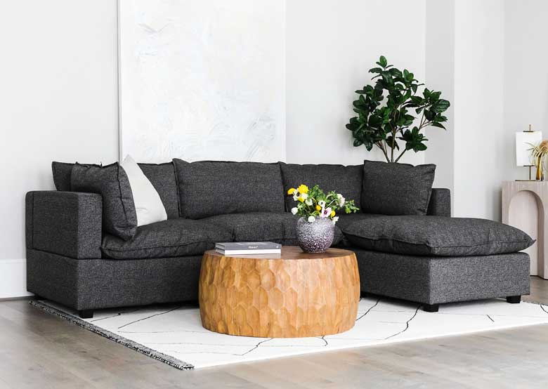 Comfortable black sectional couch - perfect for large and small living rooms