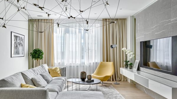 Comfortable Moscow apartment with colorful furniture and playful textures exudes sophistication