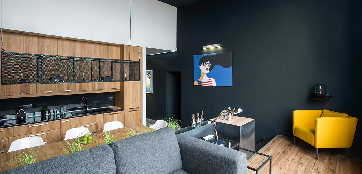 Colorful furniture and great art pieces in contemporary apartment in Hungary designed by GASPARBONTA
