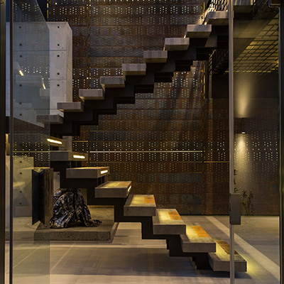 Beautiful staircase design idea in a contemporary mansion in South Africa that blends luxury with comfort - by Nico van der Meulen Architects