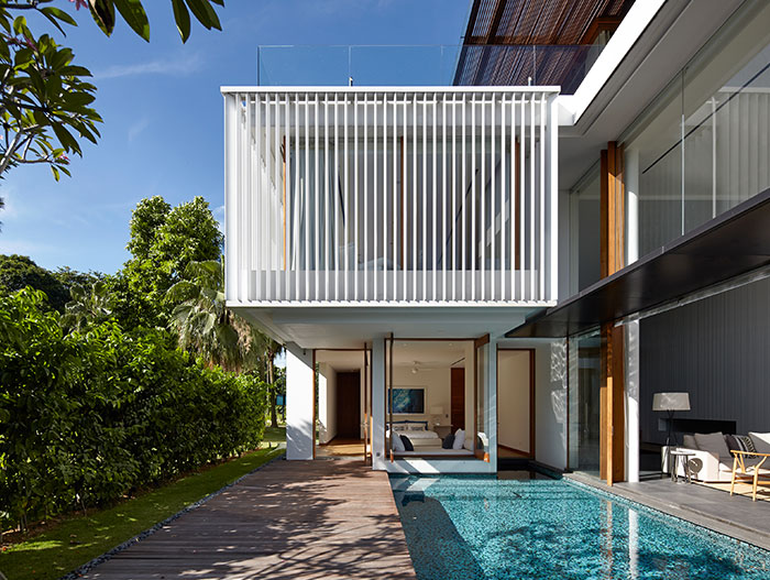 Contemporary Sentosa Cove holiday retreat for a Chinese family, designed by Robert Greg Shand Architects