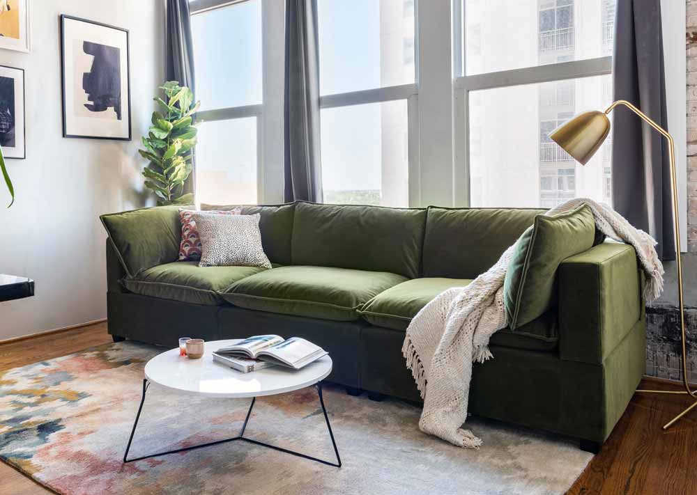 Cozy olive green velvet couch for sale