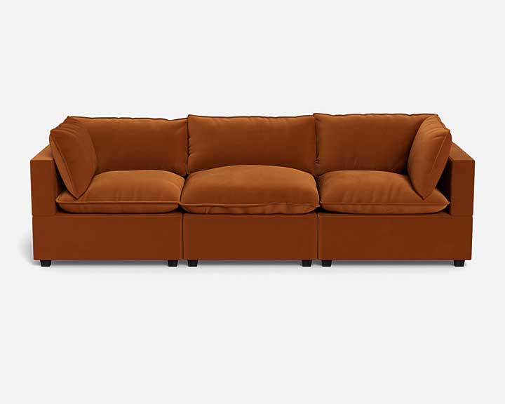 Cozy rust velvet sofa