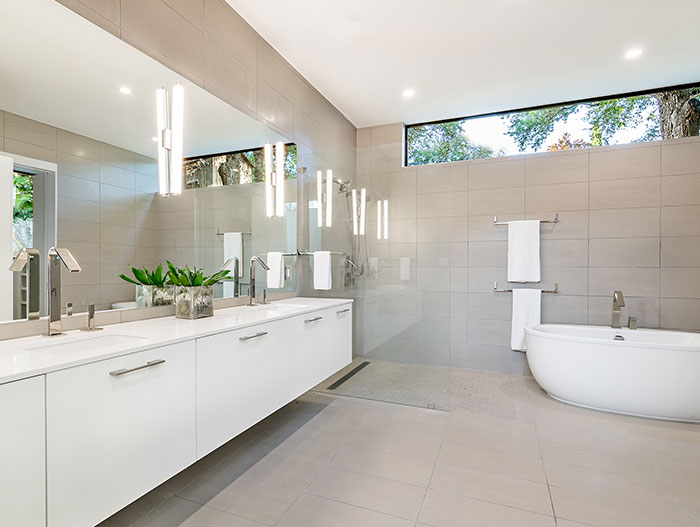 Dazzling house with modern bathroom, located in Austin, Texas - designed by Matt Fajkus Architecture for a young family