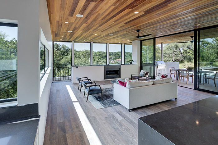Modern living room design idea in dazzling house located in Austin, Texas - by Matt Fajkus Architecture
