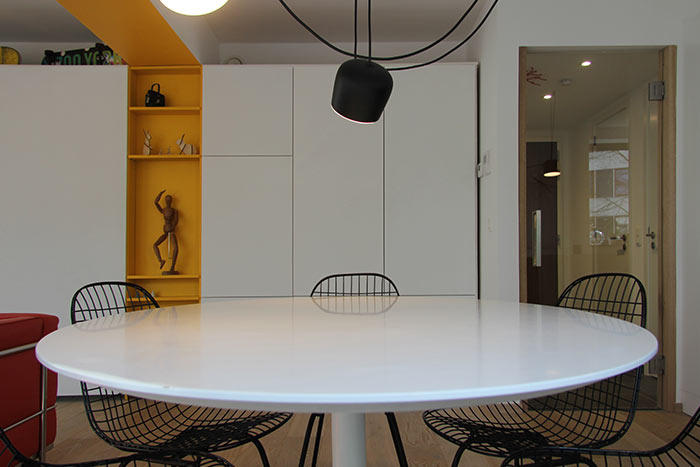 Dining area design idea in a stylish apartment located in Brussels, Belgium