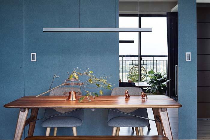 Modern dining area inside a small home in New Taipei City, Taiwan designed by Awork.Design Studio