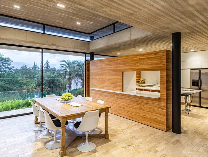 Dining room design idea in a spectacular single-family home in perfect balance with the surrounding environment - Tacuri House by Gabriel Rivera Arquitectos