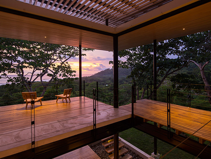 Relaxing terrace of a beautiful, eco-friendly house in Costa Rica with stunning pool and breathtaking views