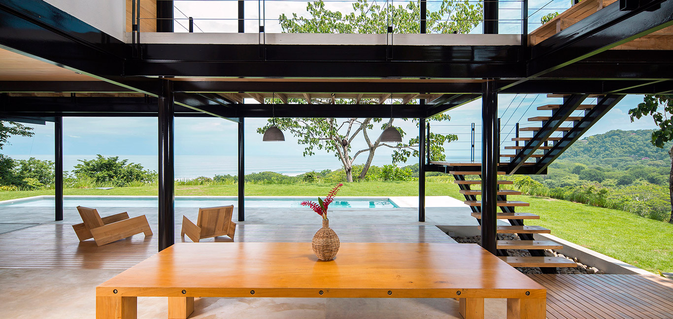 Wood is used throughout the interior of this eco-friendly house in Costa Rica with breathtaking views of the ocean - design by Benjamin Garcia Saxe