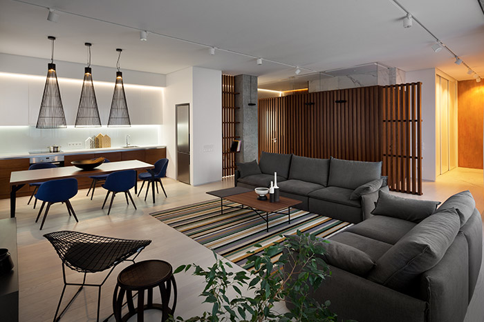 Elegant living room in minimalist apartment in Ukraine by NOTT Design