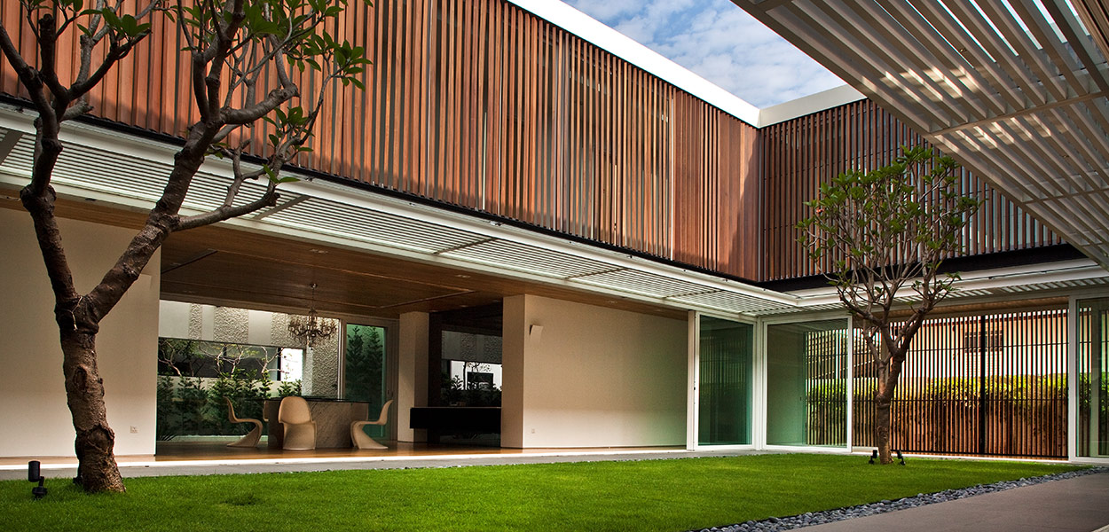 Amazing dining room design idea in a spacious contemporary house in Singapore that strikes a balance between privacy and openness - Enclosed Open House by Wallflower Architecture + Design