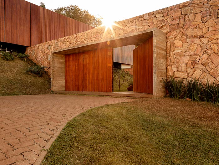 House of Stones by mf+arquitetos located in Brazil - entry door to the beautiful Brazilian house